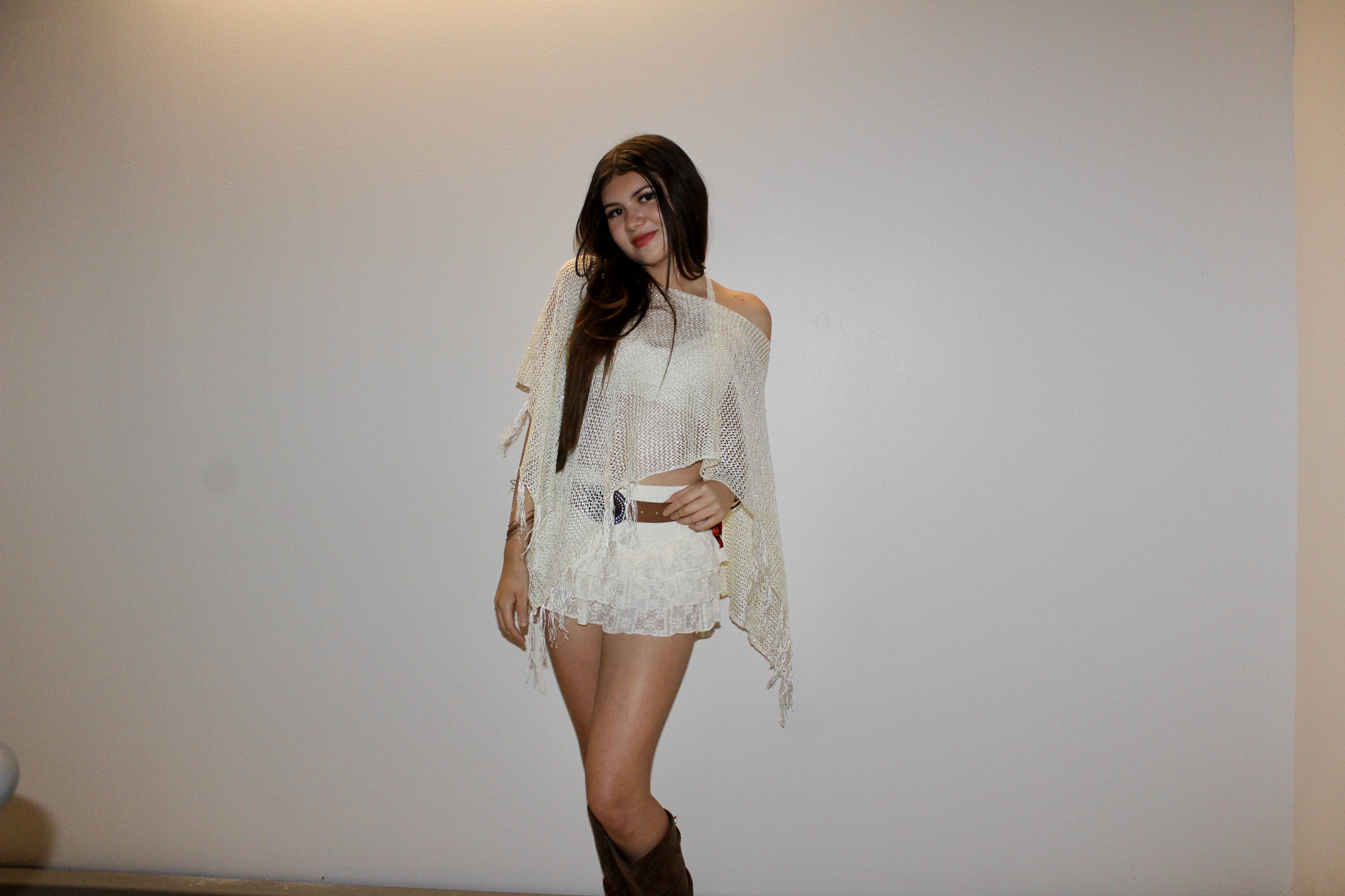 A woman wearing an indie outfit.